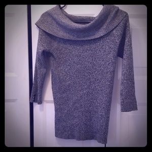 Off shoulder top with silver buttons on the arms